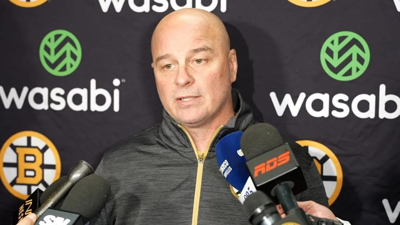 Jim Montgomery addressing the media