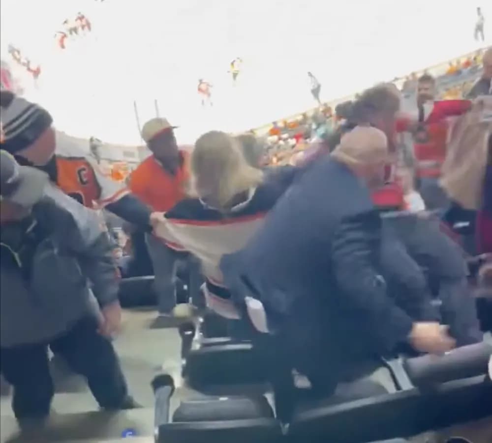 New Jersey Devils and Philadelphia Flyers fans getting into a brawl