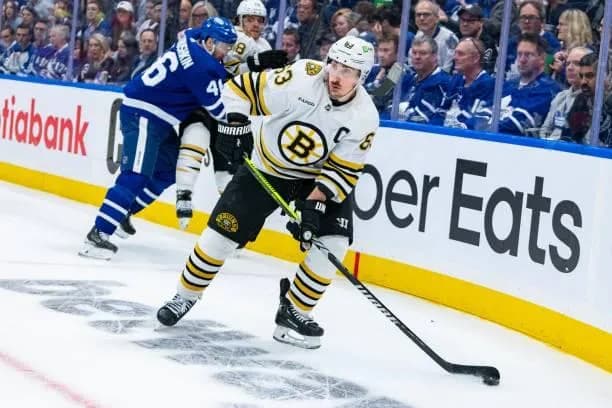 Brad Marchand skating with the puck
