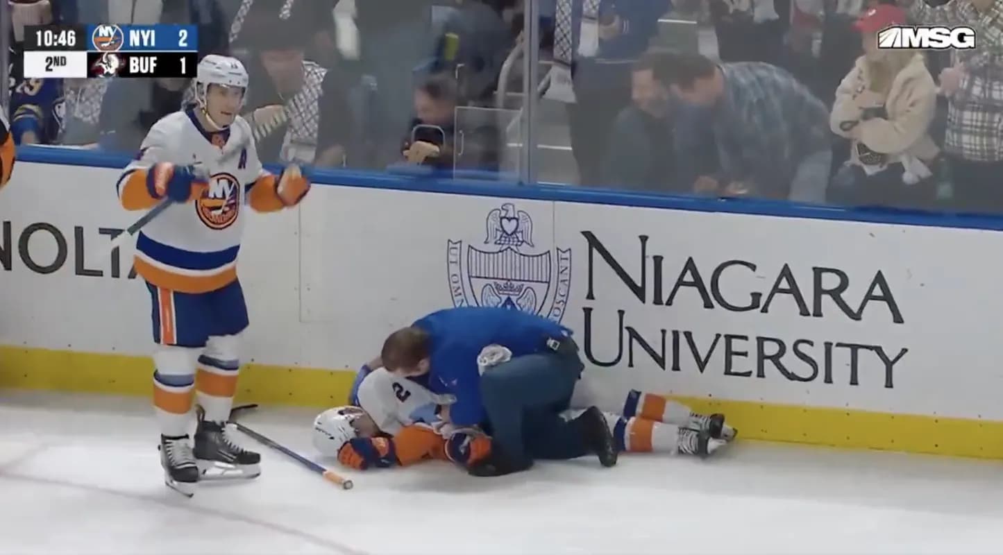 Mike Reilly laying unconscious on the ice