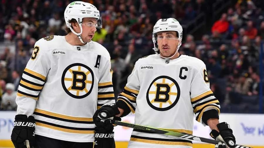 Brad Marchand and Charlie McAvoy