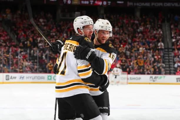 Trent Frederic and Pavel Zacha