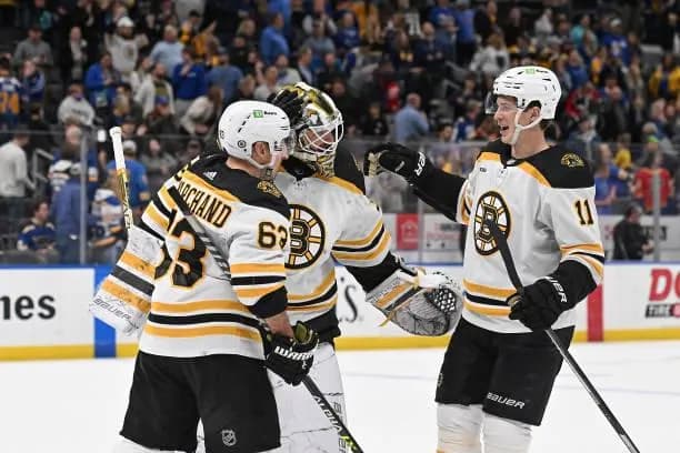 Brad Marchand, Linus Ullmark, and Trent Frederic