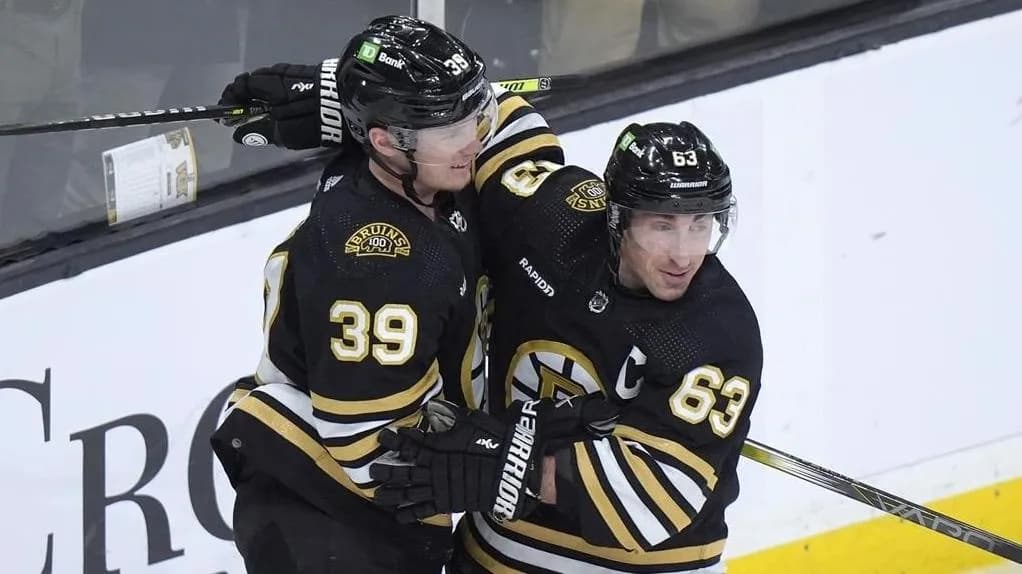 Brad Marchand and Morgan Geekie