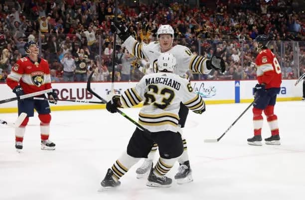 Brad Marchand and Trent Frederic