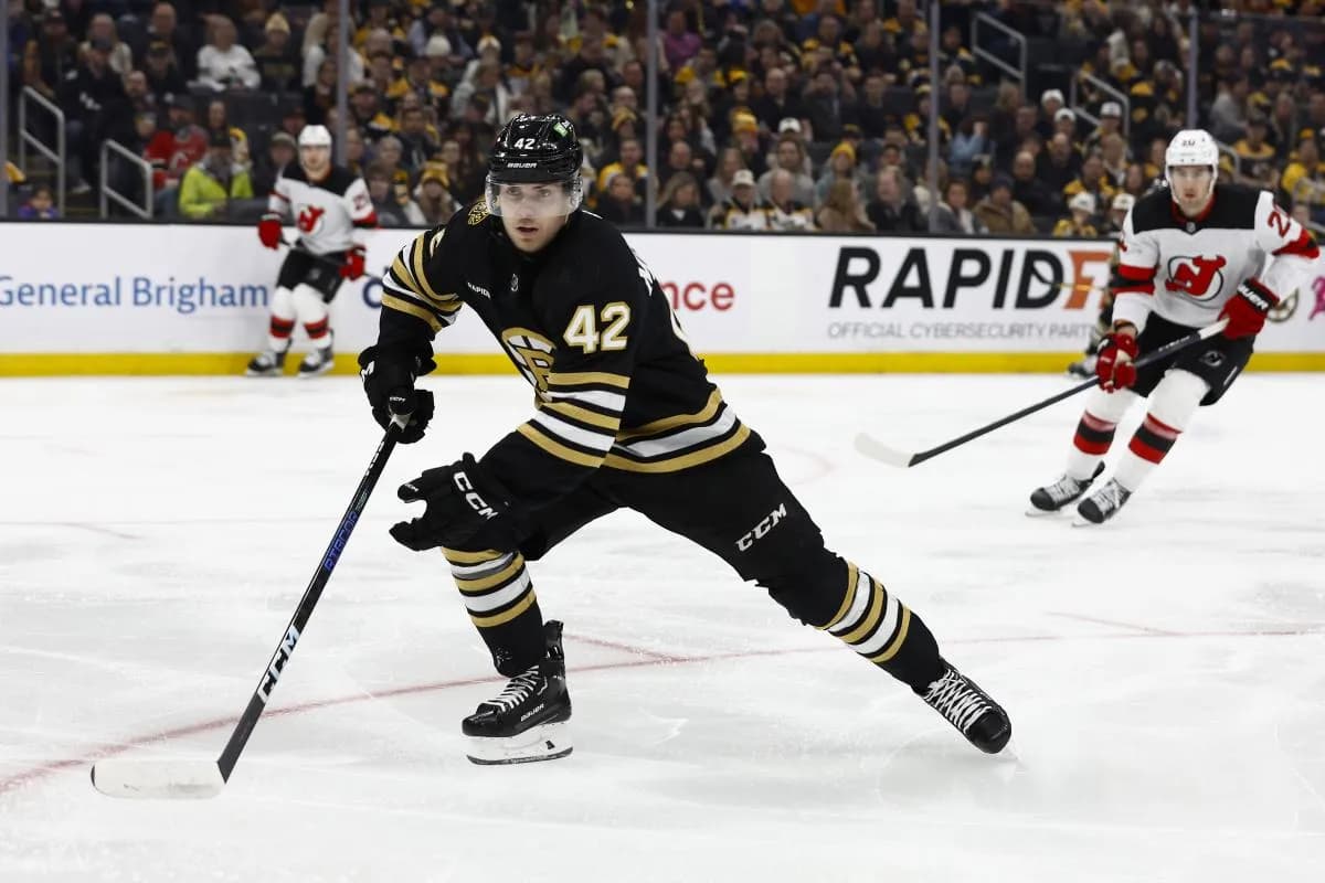 Boston Bruins center Georgii Merkulov (42) skates his first NHL shift against the New Jersey Devils during the first period at TD Garden.