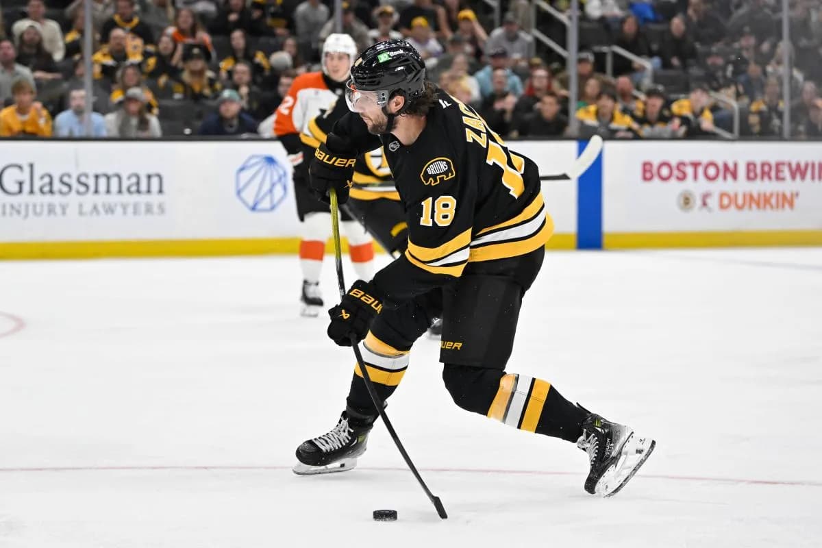 Boston Bruins center Pavel Zacha (18) shoots the puck during the third period against the Philadelphia Flyers at TD Garden.