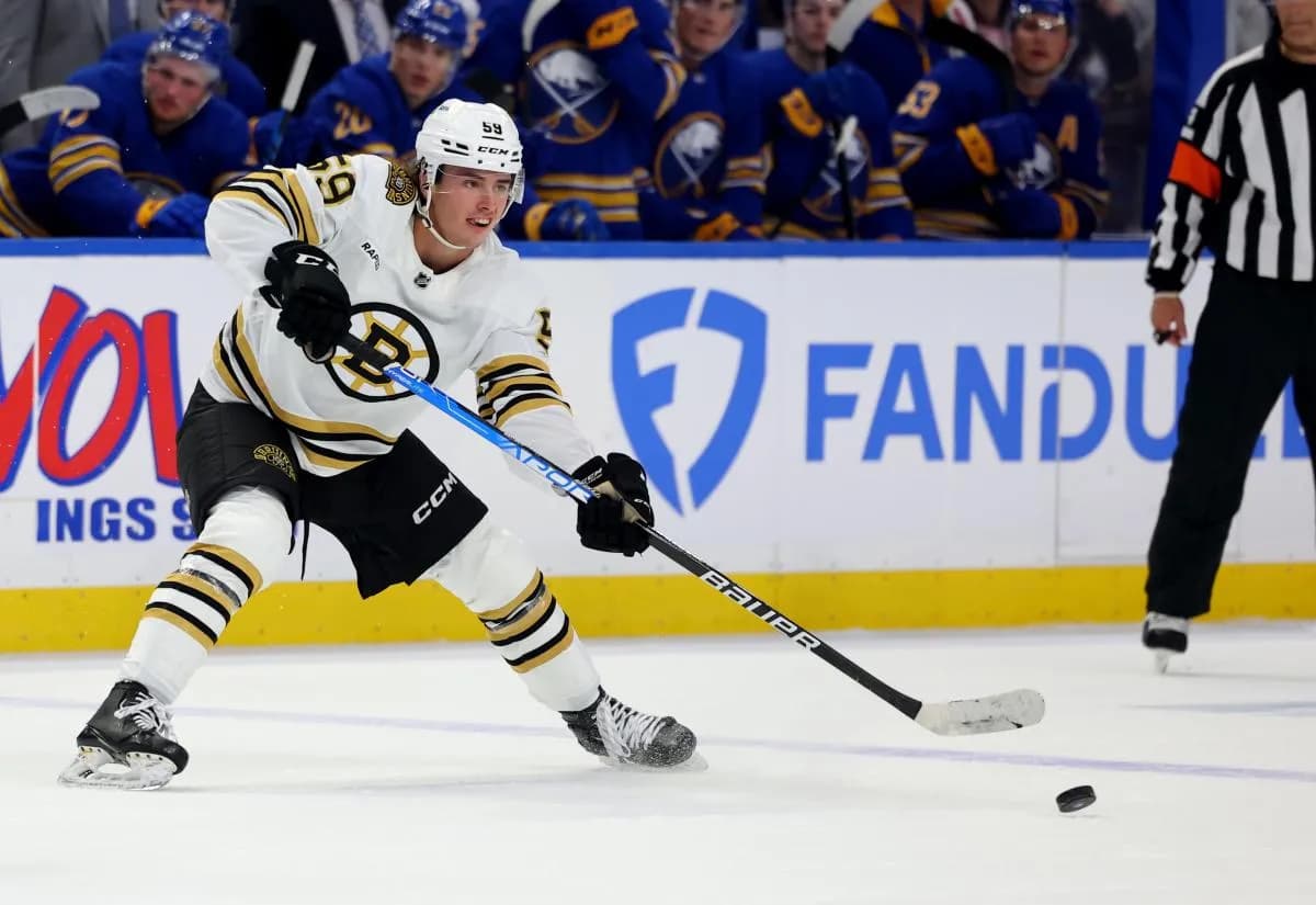 Boston Bruins defenseman Frederic Brunet (59) makes a pass during the third period against the Buffalo Sabres at KeyBank Center.