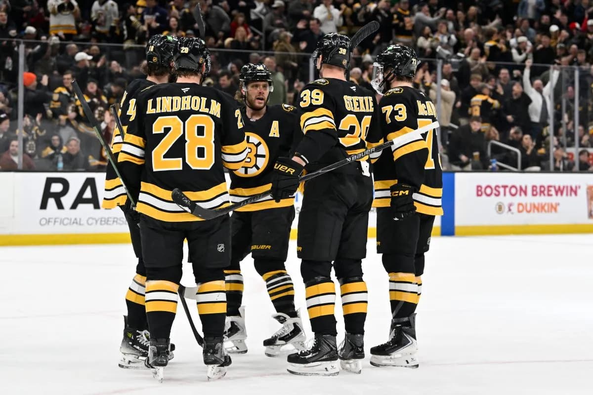 Boston Bruins center Morgan Geekie (39) celebrates his goal that was assisted by right wing David Pastrnak (88) during the first period against the Utah Mammoth at TD Garden.