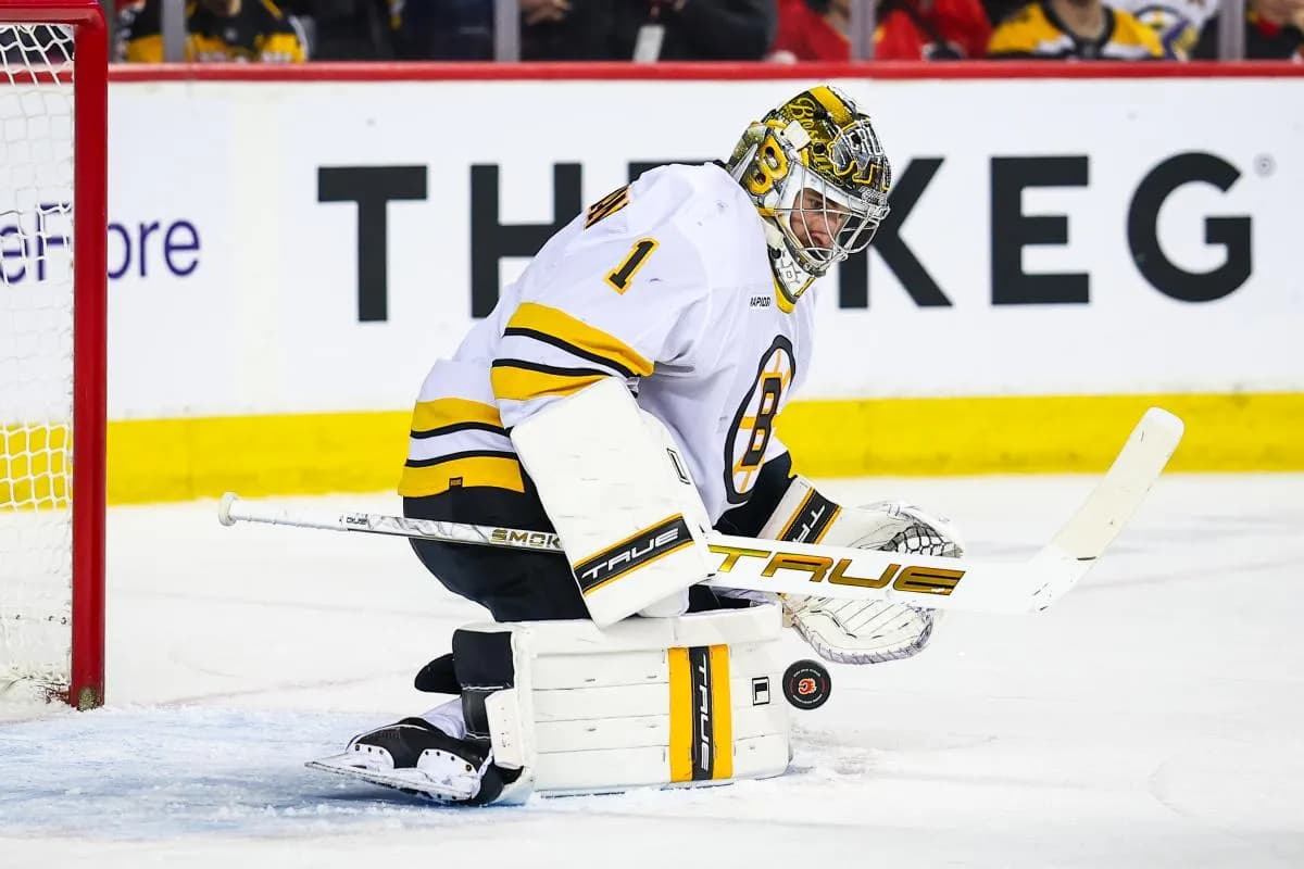 Boston Bruins goaltender Jeremy Swayman (1) makes a save against the Calgary Flames during the second period at Scotiabank Saddledome.