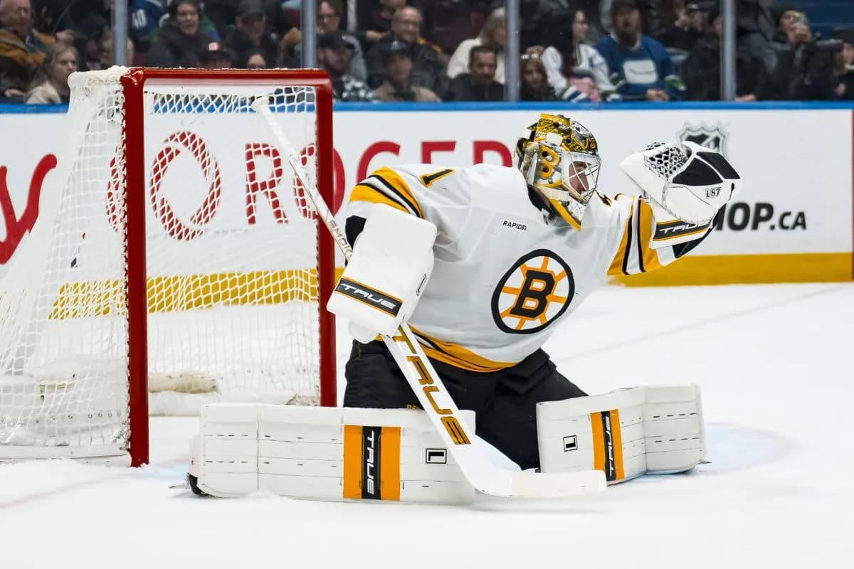Boston Bruins goalie Jeremy Swayman (1) makes a save against the Vancouver Canucks in the second period at Rogers Arena.