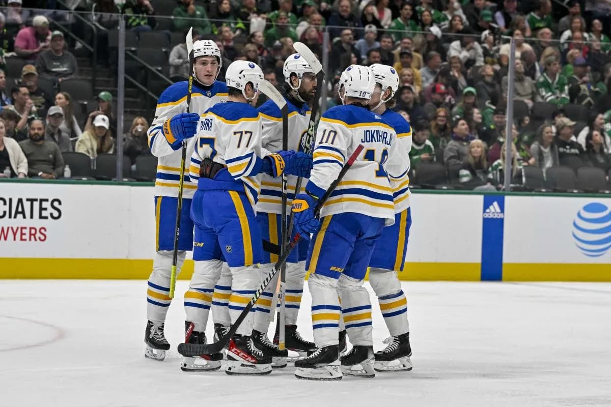 Buffalo Sabres center Tage Thompson (72) and right wing JJ Peterka (77) and right wing Alex Tuch (89) and defenseman Henri Jokiharju (10) celebrates a goal scored by Tuch against the Dallas Stars during the first period at the American Airlines Center.