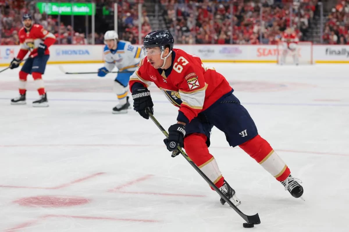 Florida Panthers left wing Brad Marchand (63) moves the puck against the St. Louis Blues during the second period at Amerant Bank Arena.