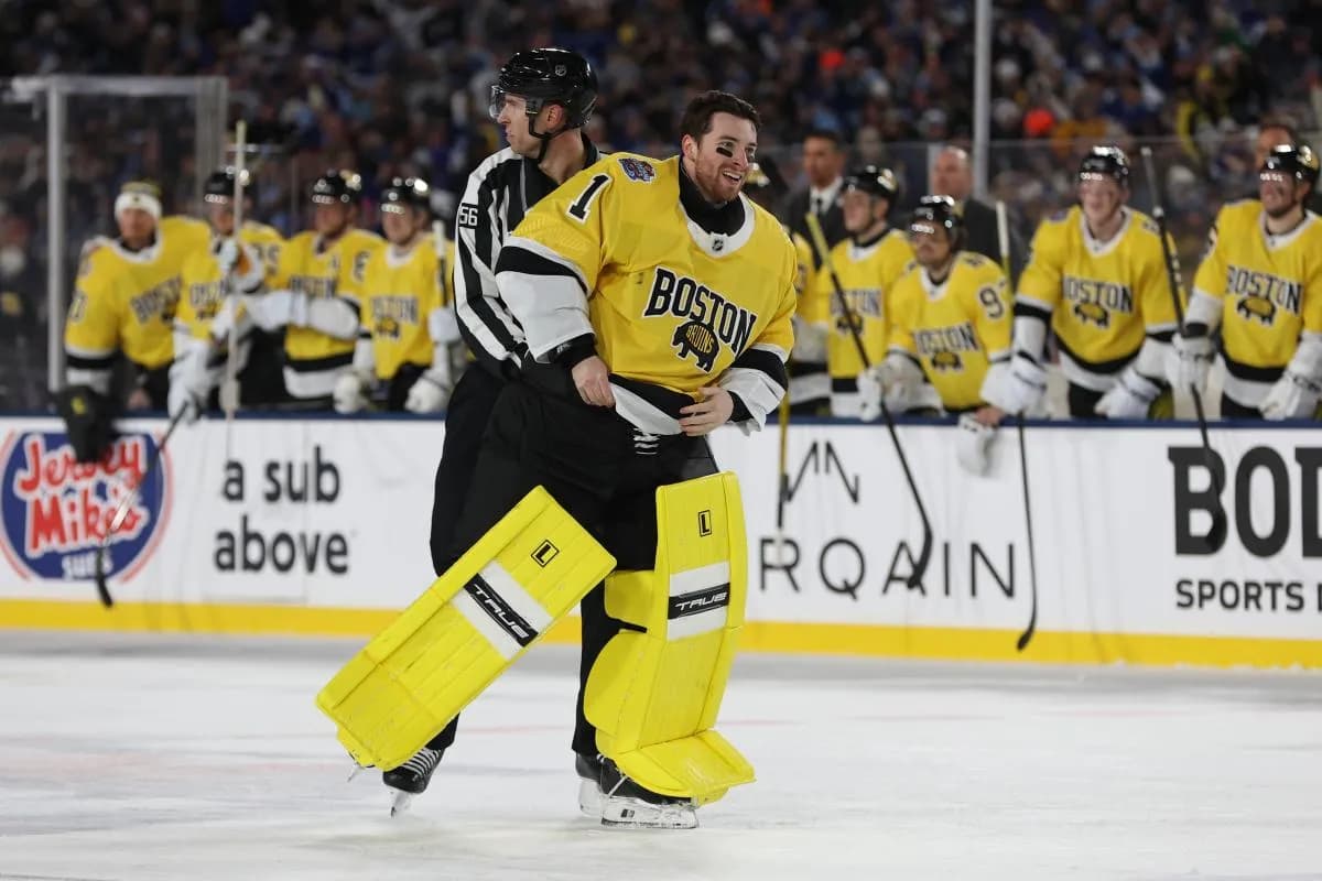 Boston Bruins goaltender Jeremy Swayman (1) skates back up ice after fight with Tampa Bay Lightning goaltender Andrei Vasilevskiy during the second period in the 2026 Stadium Series ice hockey game at Raymond James Stadium.