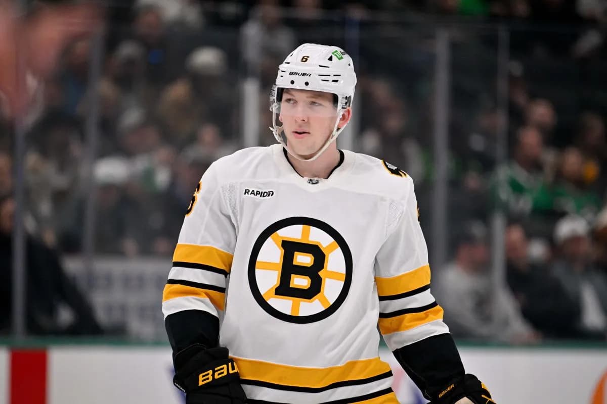 Boston Bruins defenseman Mason Lohrei (6) looks on during the game at the American Airlines Center.