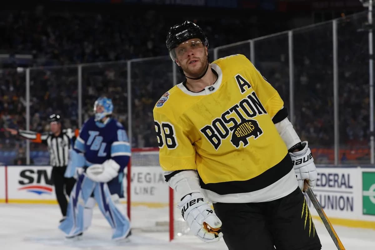 Boston Bruins right wing David Pastrnak (88) reacts after missing during a shootout in the 2026 Stadium Series ice hockey game against the Tampa Bay Lightning at Raymond James Stadium.