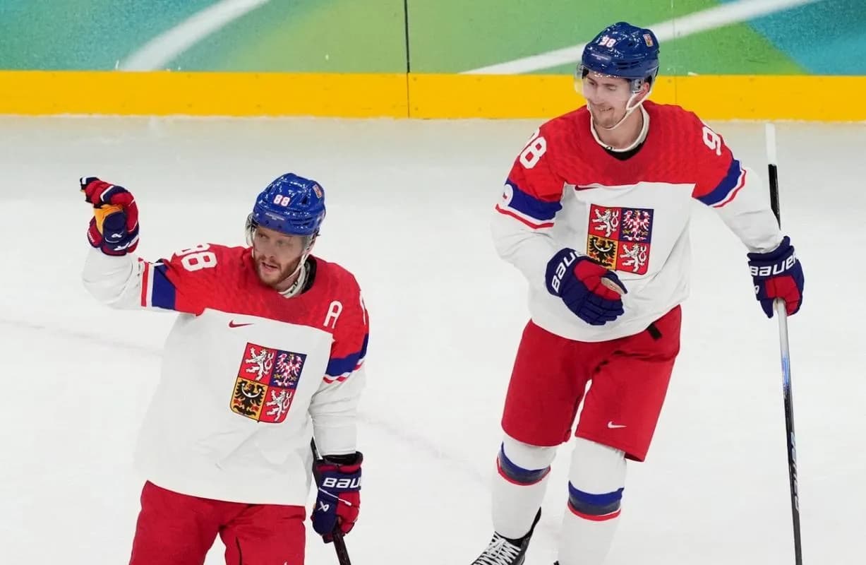 David Pastrnak of Czech Republic celebrates with Martin Necas after scoring their second goal in a men's ice hockey quarterfinal during the Milano Cortina 2026 Olympic Winter Games at Milano Santagiulia Ice Hockey Arena.