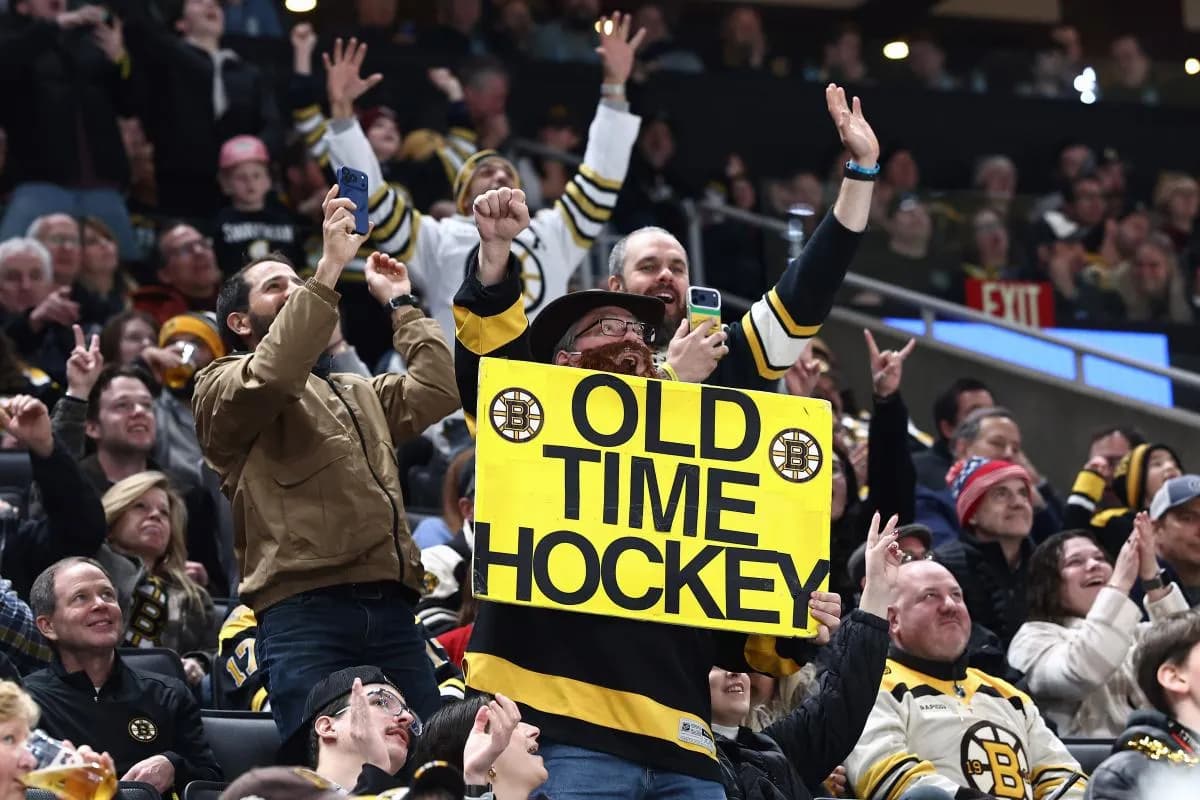 Boston Bruins fans cheer during the third period of their game against the Pittsburgh Penguins at TD Garden.