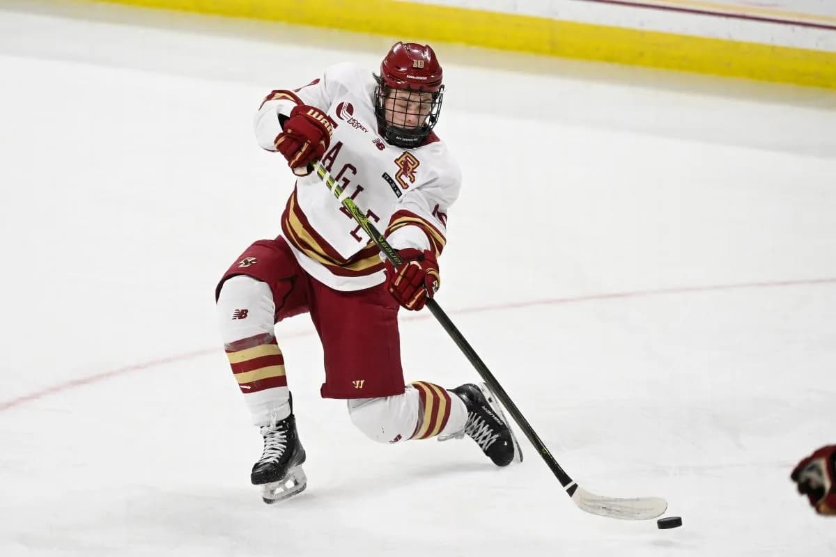 Boston College forward James Hagens (10) shoots the puck against the University of New Hampshire Wildcats during the third period at Conte Forum