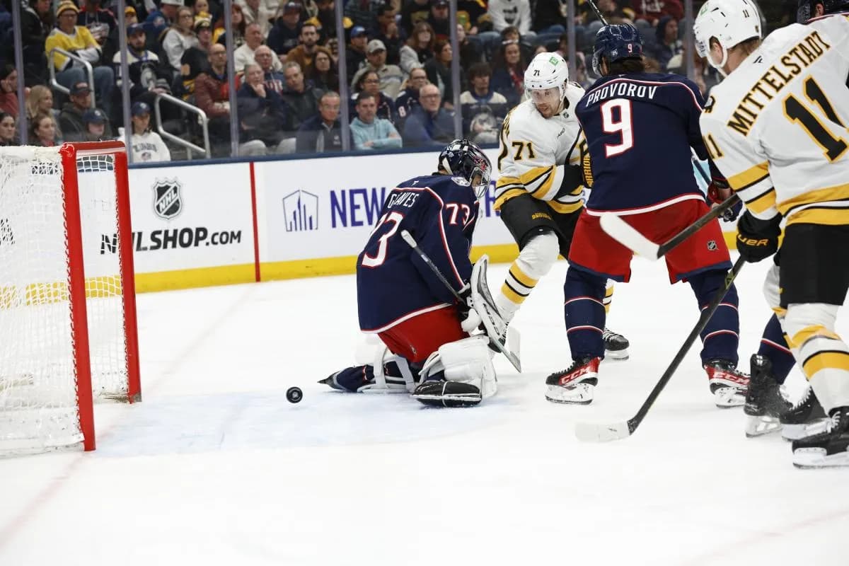 Boston Bruins center Pavel Zacha (18) (not pictured) slides into the net past Columbus Blue Jackets goalie Jet Greaves (73) during the third period at Nationwide Arena.