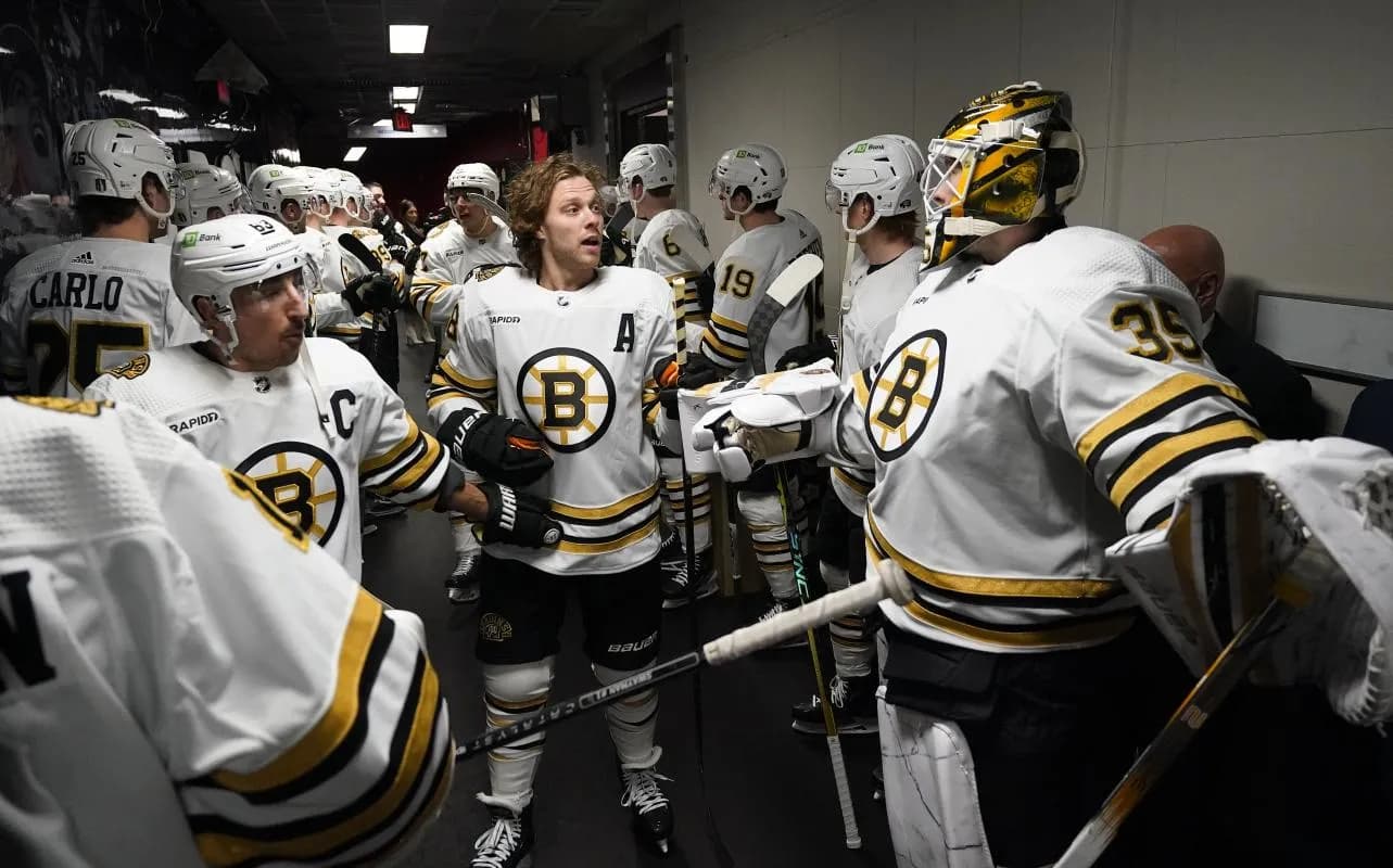 Boston Bruins forward Brad Marchand (left) and forward David Pastrnak (88) and goaltender Linus Ullmark (35) before warm-up of game three of the first round of the 2024 Stanley Cup Playoffs against the Toronto Maple Leafs at Scotiabank Arena