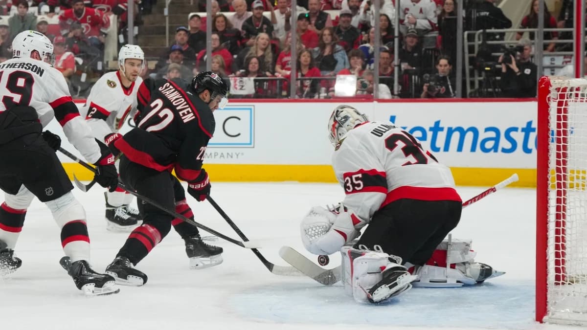 Carolina Hurricanes center Logan Stankoven (22) takes a shot on Ottawa Senators goaltender Linus Ullmark (35) during the first period in game one of the first round of the 2026 Stanley Cup Playoffs at Lenovo Center.