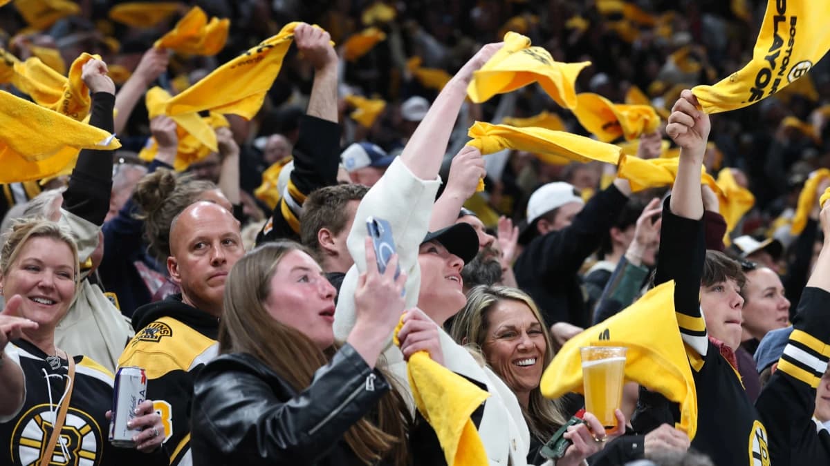 Boston Bruins fans cheer after right wing David Pastrnak (88) scored against the Buffalo Sabres during the second period of game six of the first round of the 2026 Stanley Cup Playoffs at TD Garden.