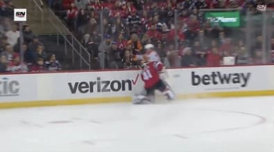 Goalie running into player