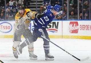 Brad Marchand and Matthew Knies