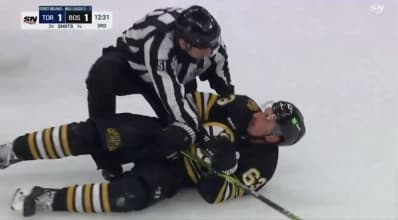 Brad Marchand getting rocked by a ref
