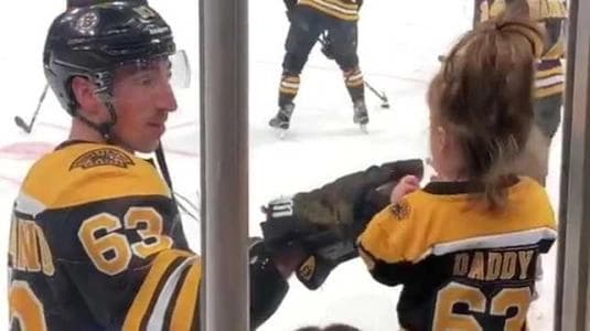 Brad Marchand with his daughter