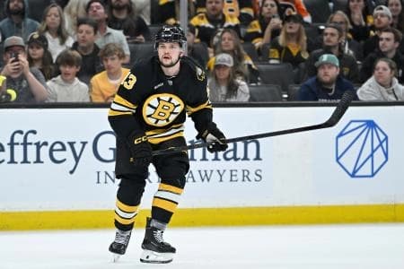 Boston Bruins right wing Matej Blumel (13) watches the puck during the third period against the Philadelphia Flyers at TD Garden.