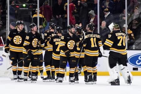 The Boston Bruins celebrate their win over the Philadelphia Flyers at TD Garden.