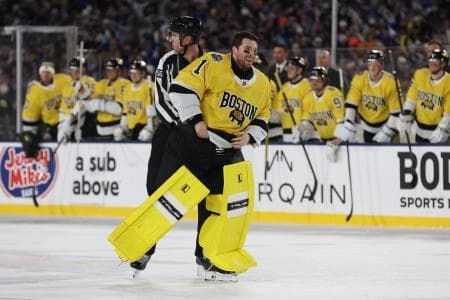 Boston Bruins goaltender Jeremy Swayman (1) skates back up ice after fight with Tampa Bay Lightning goaltender Andrei Vasilevskiy during the second period in the 2026 Stadium Series ice hockey game at Raymond James Stadium.