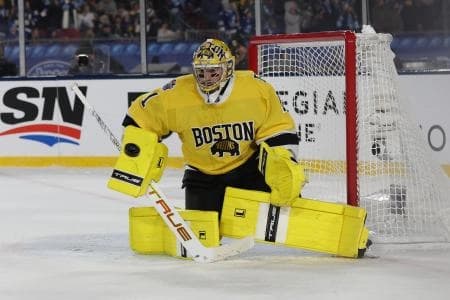 Boston Bruins goaltender Jeremy Swayman (1) prepares to make the save against the Tampa Bay Lightning during overtime in the 2026 Stadium Series ice hockey game at Raymond James Stadium.