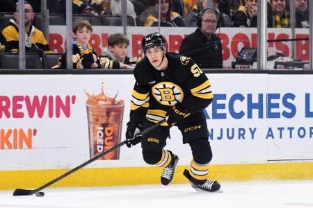 Boston Bruins forward Matt Poitras (51) controls the puck during the third period against the Philadelphia Flyers at TD Garden.