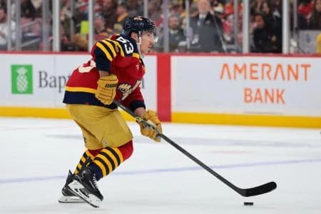 Florida Panthers left wing Brad Marchand (63) moves the puck against the Boston Bruins during the first period at Amerant Bank Arena.