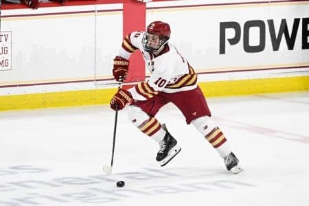 Boston College forward James Hagens (10) skates with the puck during the second period against the University of New Hampshire Wildcats at Conte Forum.