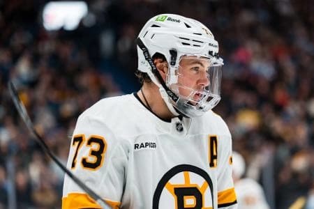 Boston Bruins defenseman Charlie McAvoy (73) during a stop in play against the Vancouver Canucks in the second period at Rogers Arena.