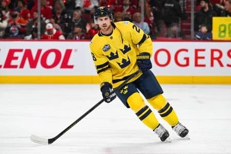 [Imagn Images direct customers only] Team Sweden forward Elias Lindholm (28) skates in warm-up before the game against Team Canada during a 4 Nations Face-Off ice hockey game at Bell Centre.
