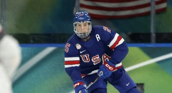 Charlie McAvoy of United States in action against Denmark in men's ice hockey group C play during the Milano Cortina 2026 Olympic Winter Games at Milano Santagiulia Ice Hockey Arena.