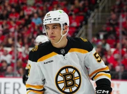 Boston Bruins center Matthew Poitras (51) looks on against the Carolina Hurricanes during the first period at Lenovo Center