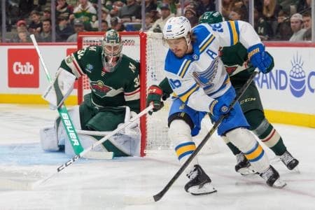 St. Louis Blues center Robert Thomas (18) attempts a wrap around on Minnesota Wild goaltender Filip Gustavsson (32) in the third period at Grand Casino Arena.