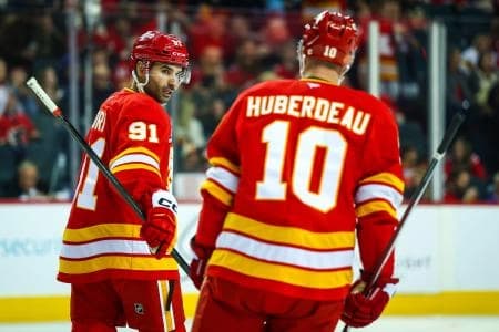 Calgary Flames center Nazem Kadri (91) celebrates his goal with left wing Jonathan Huberdeau (10) during the first period against the New York Rangers at Scotiabank Saddledome.