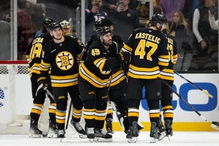 Boston Bruins defenseman Jonathan Aspirot (45) celebrates after the win against the Pittsburgh Penguins at TD Garden.