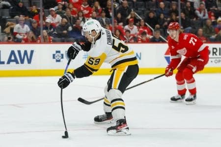 Pittsburgh Penguins right wing Yegor Chinakhov (59) scores a goal in the first period against the Detroit Red Wings at Little Caesars Arena.