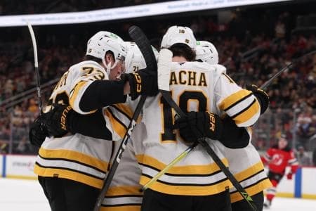 Boston Bruins center Pavel Zacha (18) celebrates his goal against the New Jersey Devils during the first period at Prudential Center.