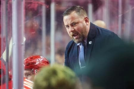 Calgary Flames Assistant coach Marc Savard during the second period on his bench against the Seattle Kraken at Scotiabank Saddledome