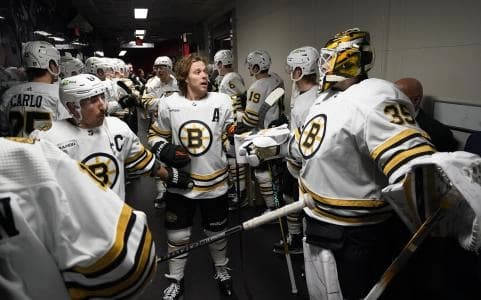 Boston Bruins forward Brad Marchand (left) and forward David Pastrnak (88) and goaltender Linus Ullmark (35) before warm-up of game three of the first round of the 2024 Stanley Cup Playoffs against the Toronto Maple Leafs at Scotiabank Arena