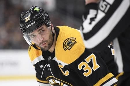 Boston Bruins center Patrice Bergeron (37) gets ready for a face-off during the first period in game five of the first round of the 2023 Stanley Cup Playoffs against the Florida Panthers at TD Garden.